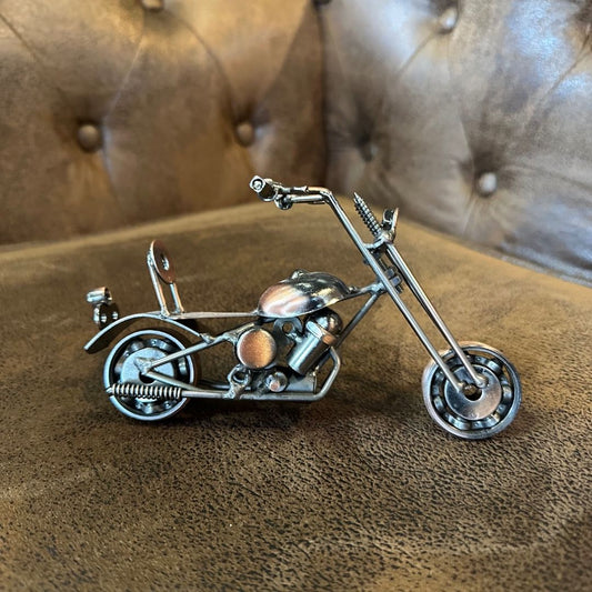 Small iron motorcycle model.